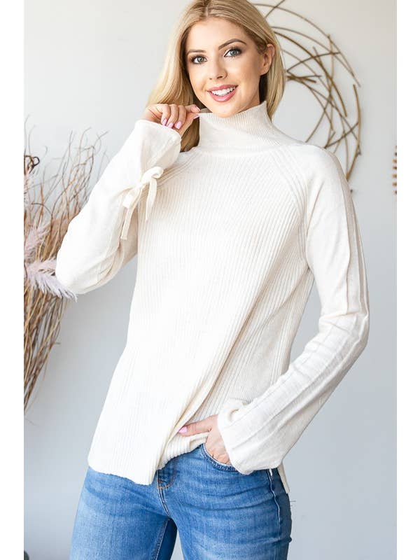 HEIMISH - Vendita all'ingrosso Top in maglia - Donna - LP137 COLLO ALTO MANICA LUNGA CON DETTAGLIO FIOCCO10