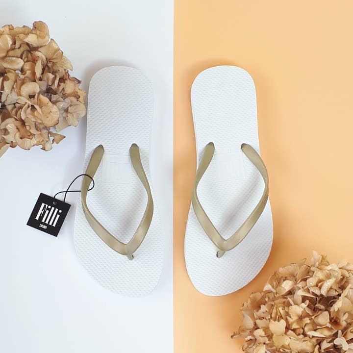 Naked Flip Flops - Gold on White and other Purchase Wholesale white flip flops. Free Returns & Net 60 Terms on Faire trending on Faire.