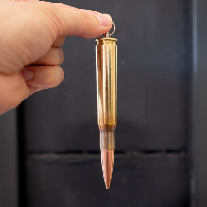 Ciondolo a cartuccia Nato da .50 Bmg/12,7 × 99 mm con fiammifero per la vendita all'ingrosso da parte di Copper and Brass