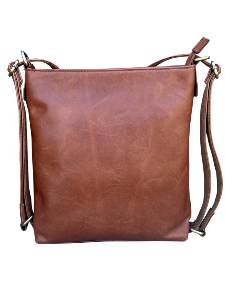 Waxed oil cowhide leather crossbody backpack for wholesale by Roma Leathers, Inc.