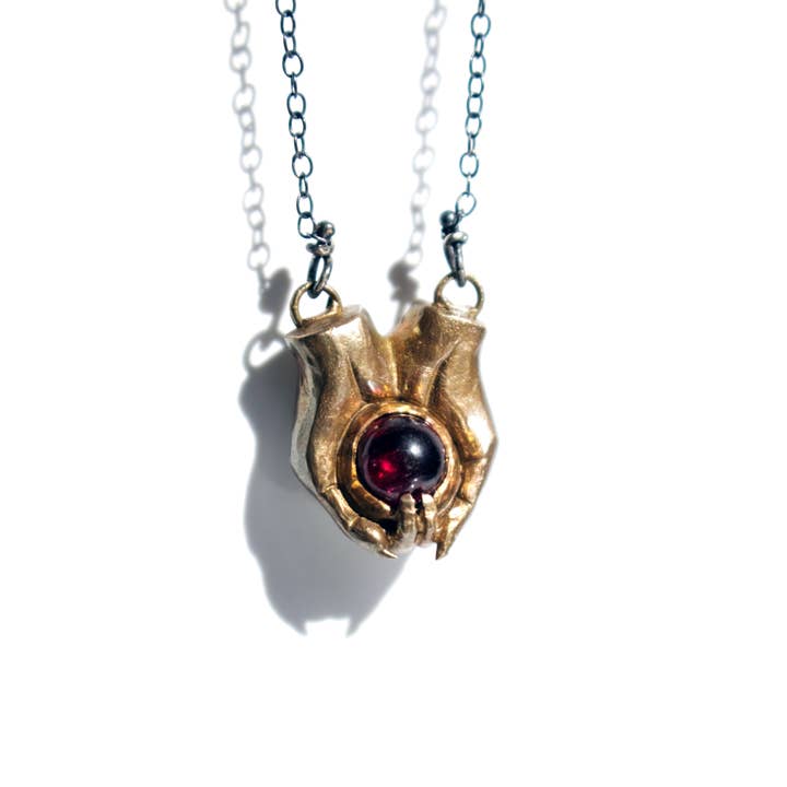 Brass Garnet Goblin Hands Necklace for wholesale by Creature's Virtue