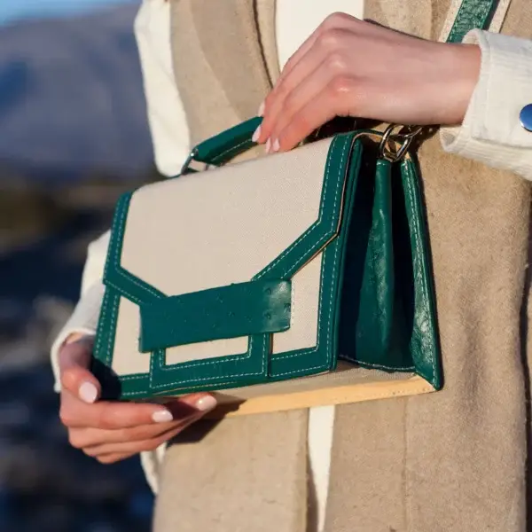 Alca Green Ostrich Leather And Linen Flip Bag for wholesale on Faire5