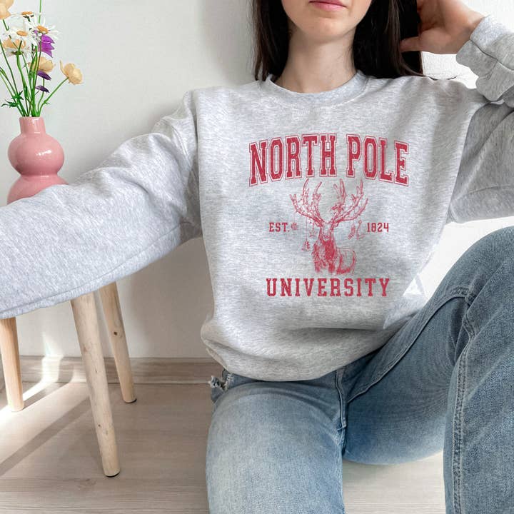 Wholehearted Motherhood and Co. - Wholesale Graphic Sweatshirt - Women's - North Pole University Christmas Sweatshirt - Christmas Tee