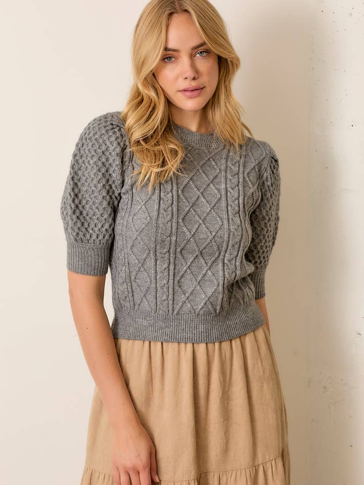 TOP A MANICHE CORTE IN MAGLIA per la vendita all'ingrosso da parte di Polagram by Wellmade USA