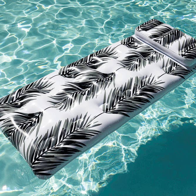 Black White Paradise Lounger Pool Float for wholesale on Faire3