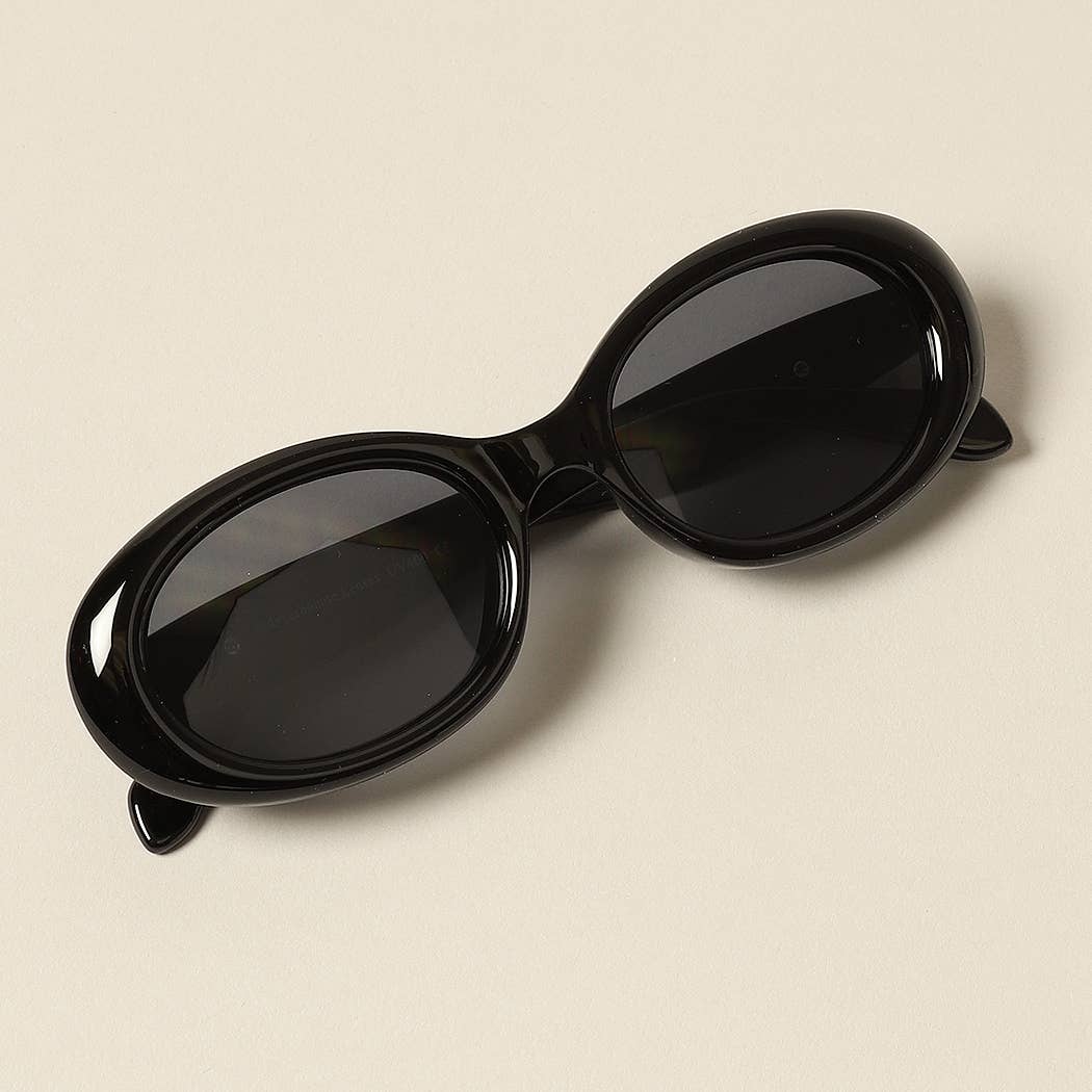 12 CORES SORTIDAS Óculos de sol Oval Glitter da moda para mulher para venda a revendedores na Faire8