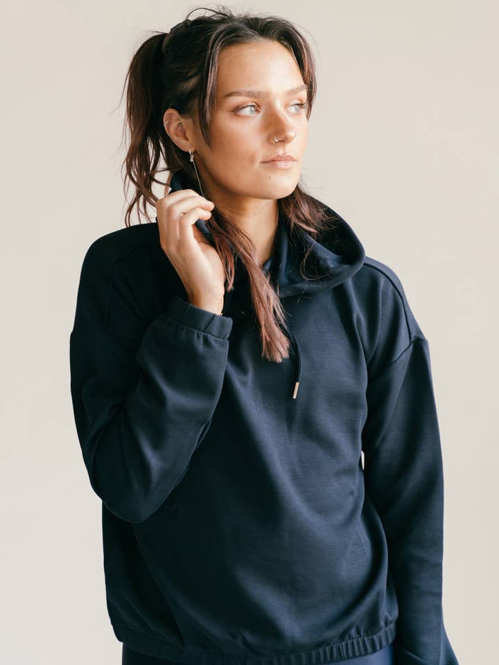 Athlecia Namier hættetrøje, mørk safir for engroshandel hos YUMAN