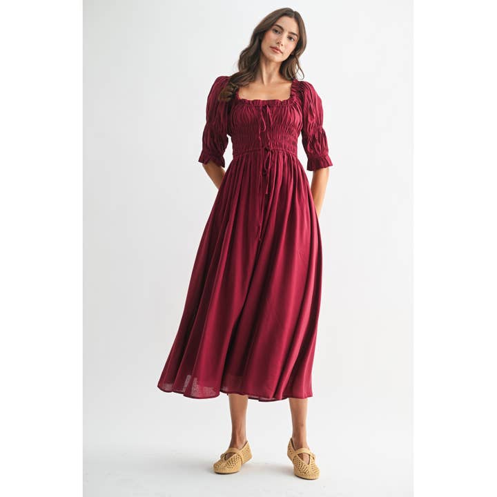 BORDEAUX OFF-SHOULDER GESMOKTE MIDI-JURK MET PLOOIENROK voor groothandel op Faire2
