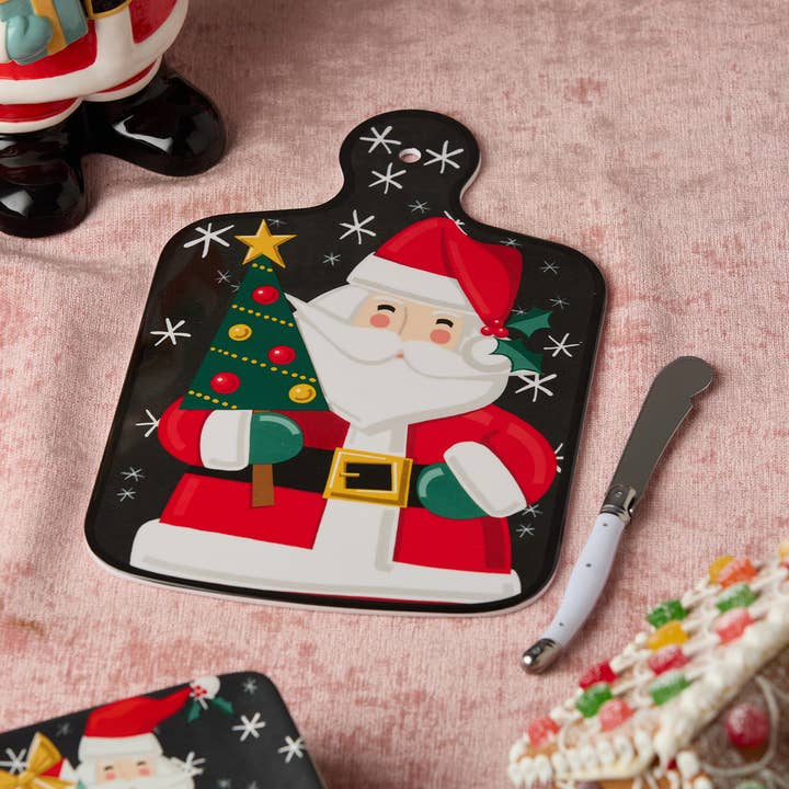 Planche à fromage et couteau Père Noël fantaisie de Noël pour la vente par Certified International