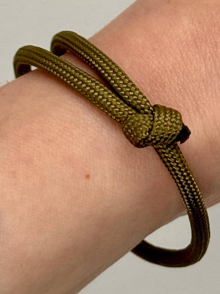 Custom Adjustable 550 Paracord Cinch Bracelet for wholesale by How We Cope, LLC