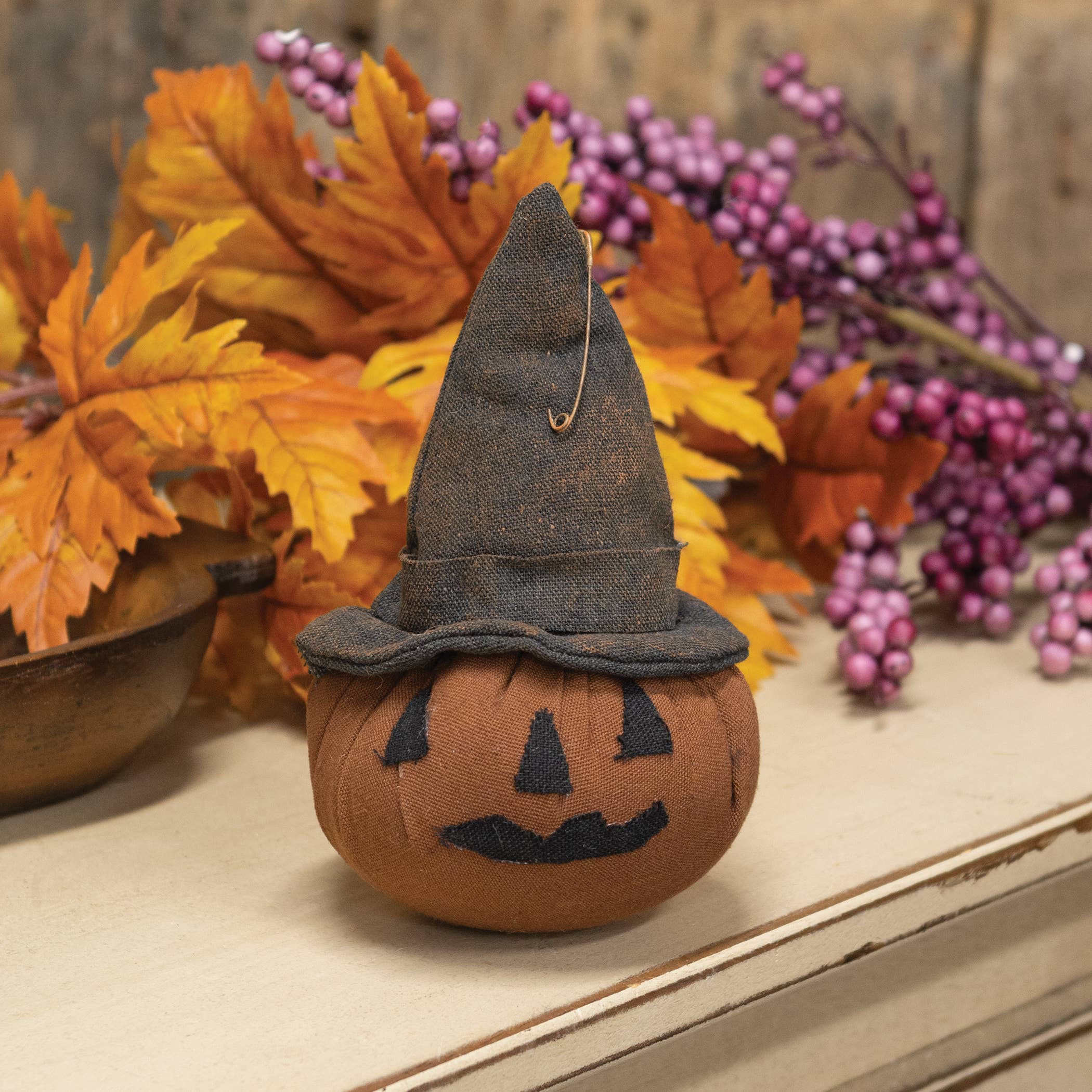 The Hearthside Collection - Wholesale Decorative Tabletop Object - Grungy Stuffed Witchy Jack O Lantern Head Sitter - 4" x 7"1