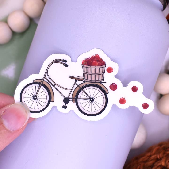 Autumn Day Apple Bicycle Sticker, 3x1.6in for wholesale by Sammy Jean Artist