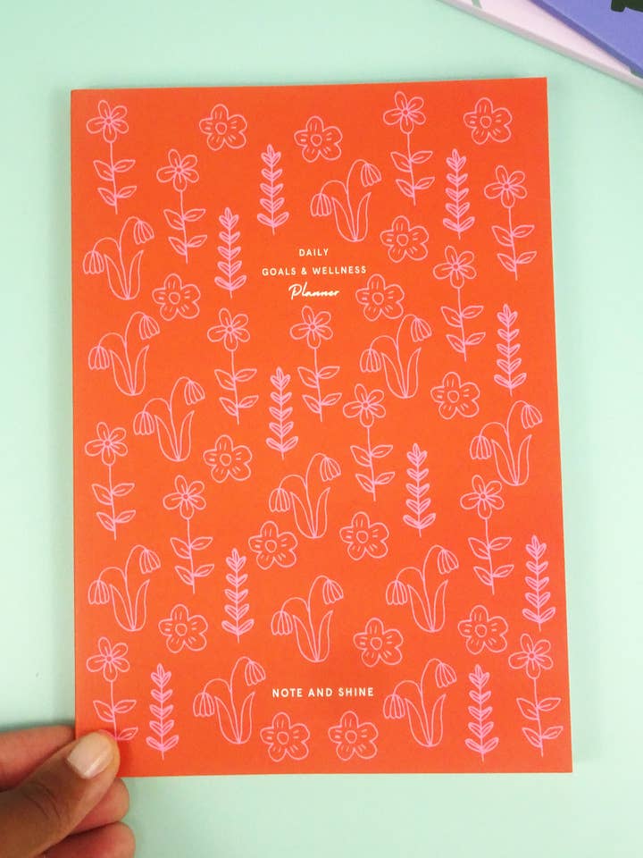 Daily Goals and Wellness Planner (Red Ditsy Flowers) for wholesale by Note and Shine