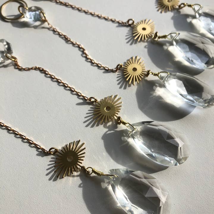 Vida + Luz - Vendita all'ingrosso Acchiappasole - Acchiappasole Occhio Amuleto | Ciondoli Dorati | Cristallo1