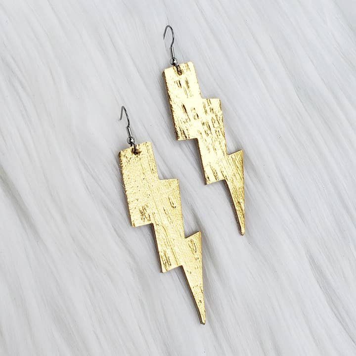Metallic Gold Lighting Bolt Leather Earrings for wholesale by The Purple Chickadee