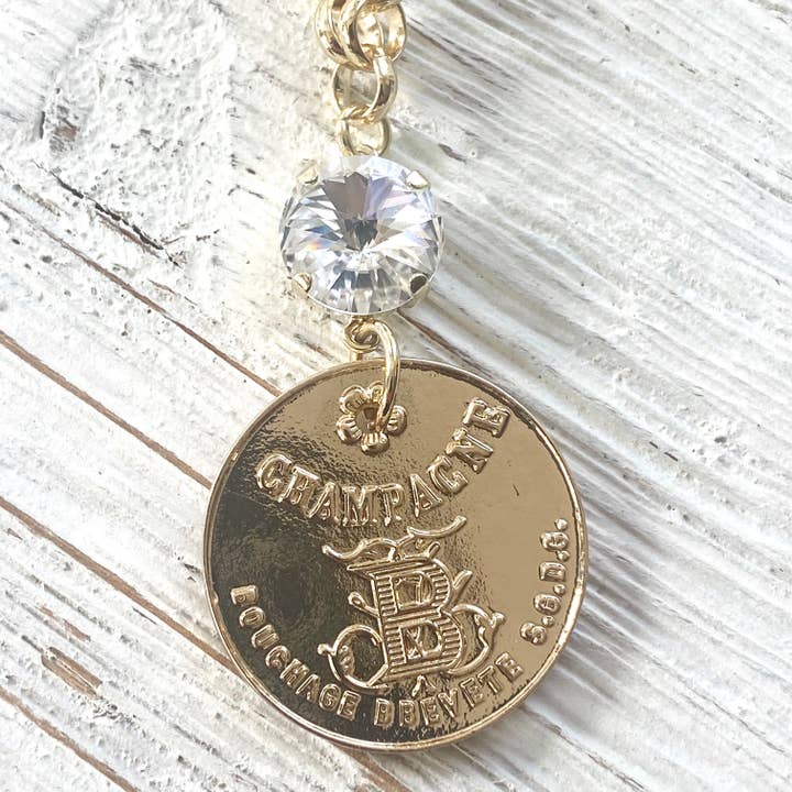 VB&CO Designs Handmade Jewelry - Vendita all'ingrosso Collana con ciondolo/pendaglio - Collana con moneta francese in champagne boutique salone gioielli