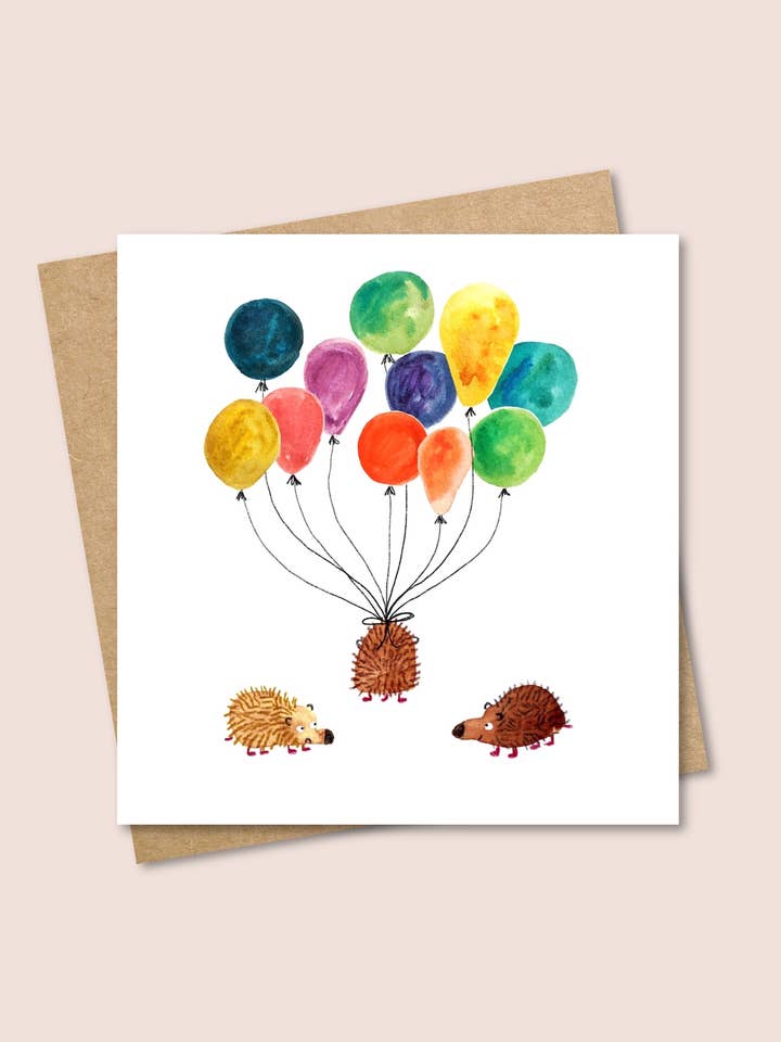 Hedgehogs with Balloons Card for wholesale by Pen and Gwyn
