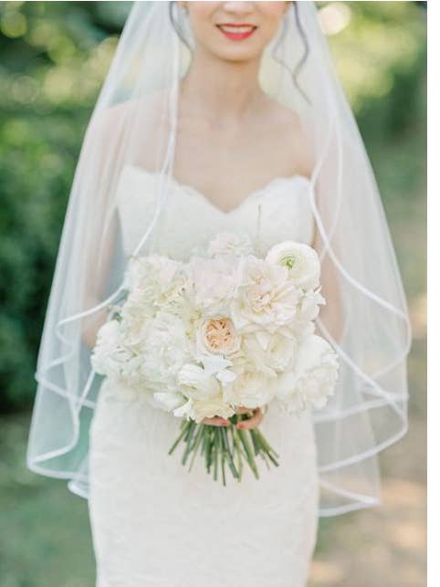 Soft Two Tier Fingertip Veil with Satin Trim for wholesale by Ruffled Rose Veils