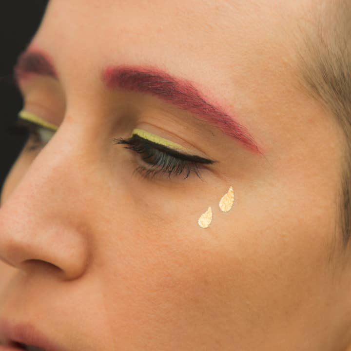 Tatuaggi temporanei Lacrime d'oro (confezione da 2) per la vendita all'ingrosso da parte di Tattoonie