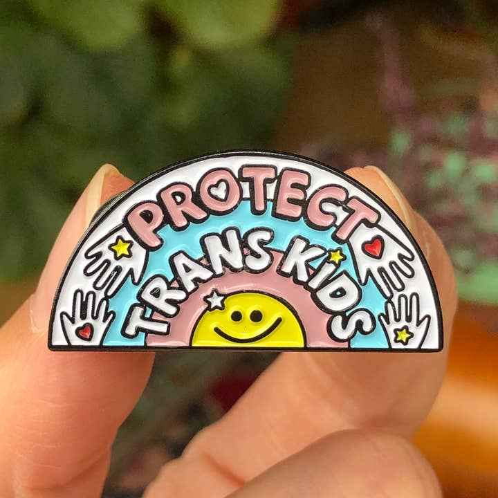 Protect Trans Kids Enamel Pin Badge for wholesale by Sophie Green Artist