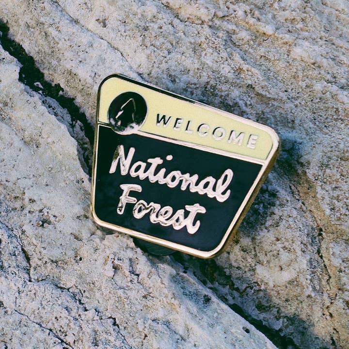 National Forest Sign Enamel Pin for wholesale by Goodnight Pine