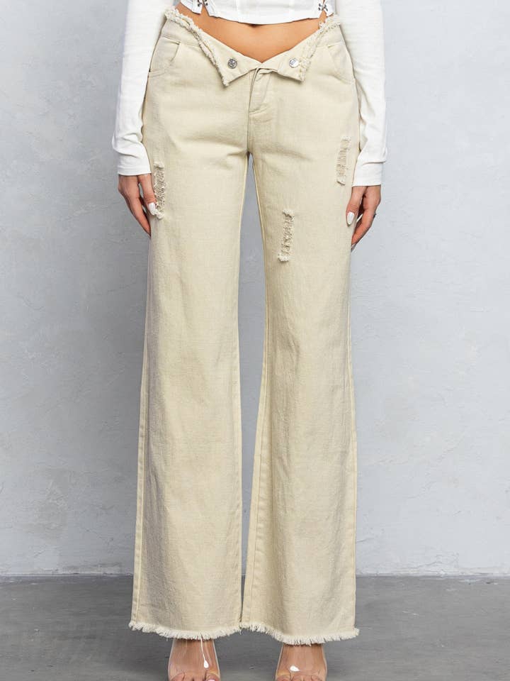 Pantaloni in twill distrutto con dettagli ripiegati a V per la vendita all'ingrosso da parte di No Vacancy