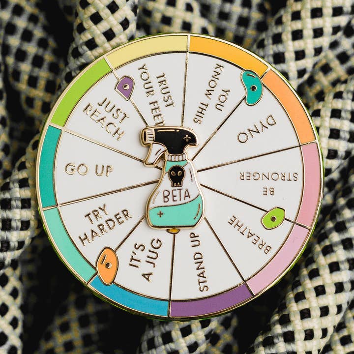 Beta Wheel Enamel Pin for wholesale by Occasionalish