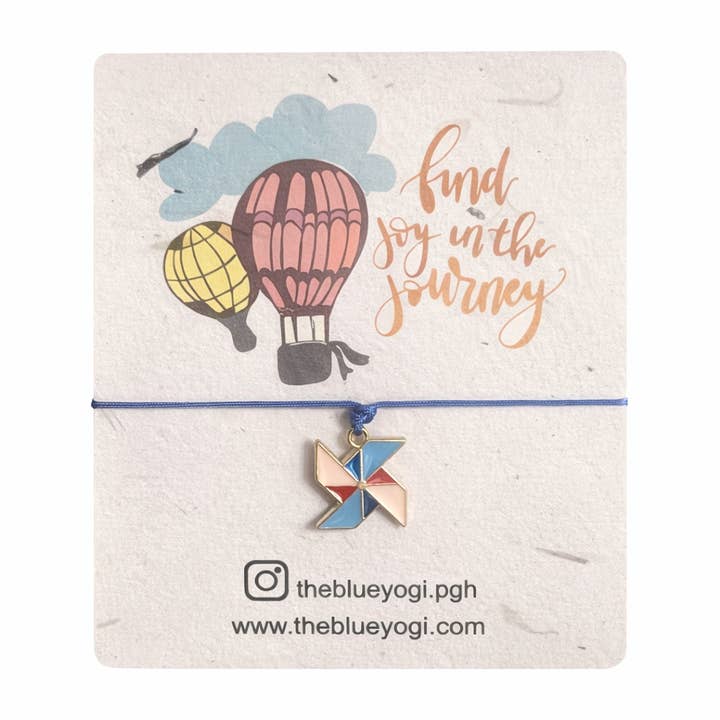 Journey Adjustable charm bracelet on a Plantable seed paper for wholesale by The Blue Yogi