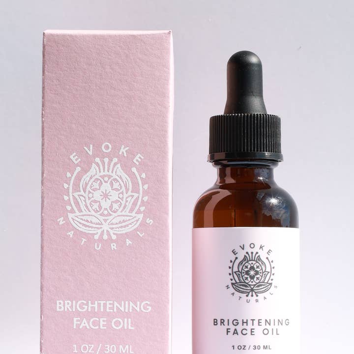 HUILE POUR LE VISAGE ÉCLAIRCISSANTE au safran et à la grenade pour la vente par Evoke Naturals