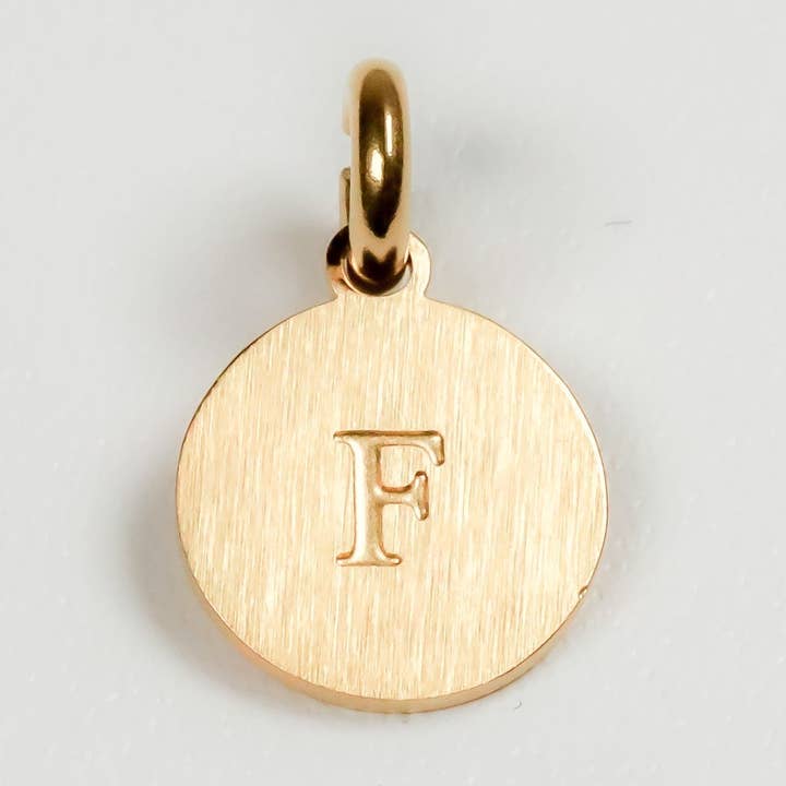 Ciondolo «F» per la vendita all'ingrosso da parte di The Inspiration Company
