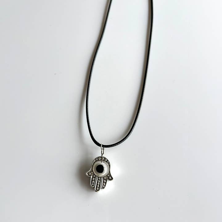 Colgante Hamsa Hand Spinning Evil Eye para venta al por mayor de VIE