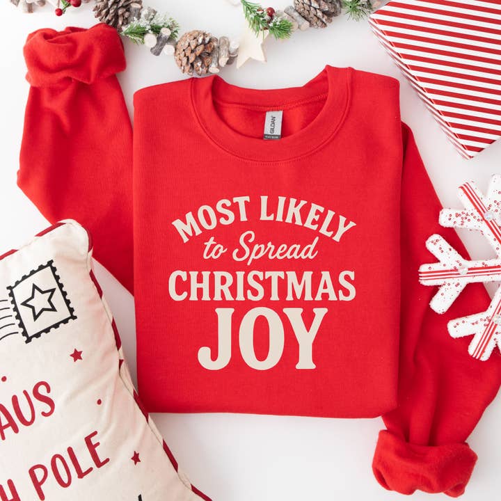 Most Likely To Spread Christmas Joy Graphic Sweatsh for wholesale by Etched Laser