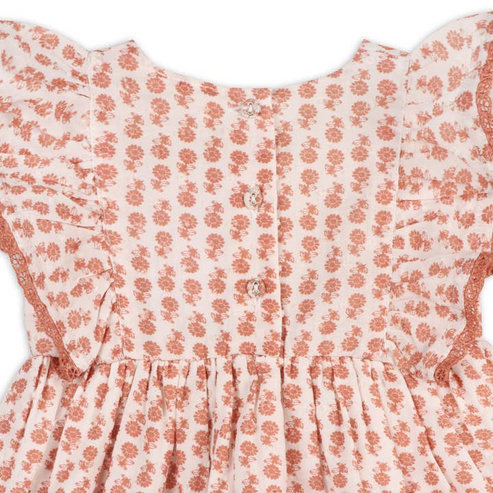 Terracotta floreale Abito da bambino floreale in cotone Heather Dobby + Bloomer (biologico) in vendita all'ingrosso su Faire4