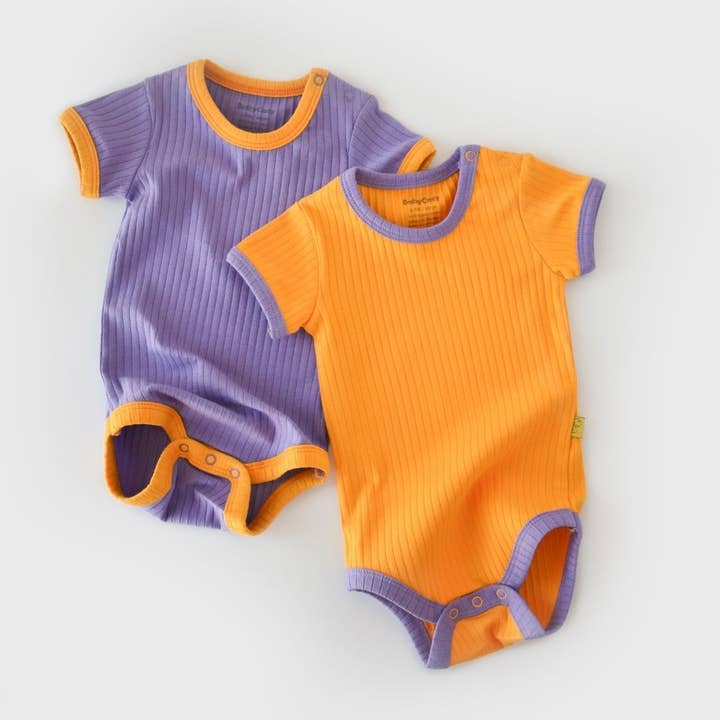 RETRO pakke med 2 kortærmede bodystockings i 95 % økologisk bomuld og 5 % elastan for engroshandel hos BabyCosy Organic