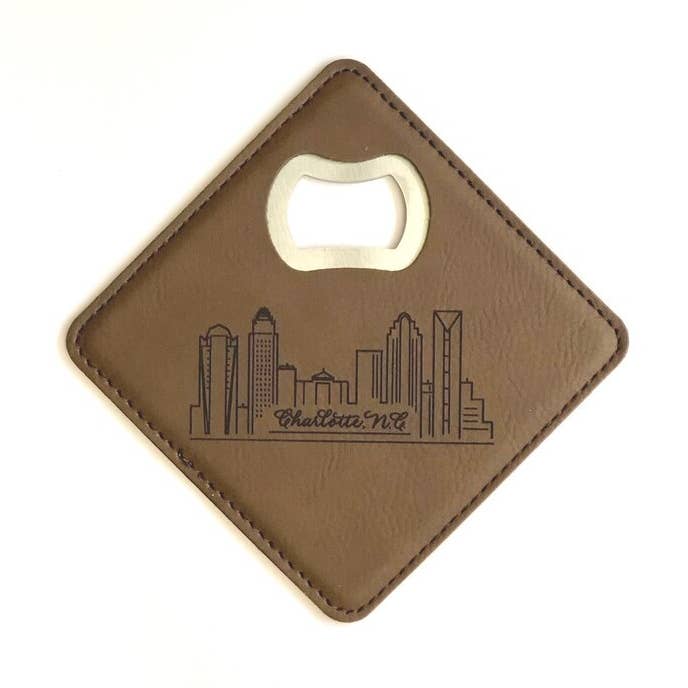 Leather-like Laser-engraved Coaster/bottle Opener With Charlotte Skyline for wholesale by The Write Occasion Calligraphy