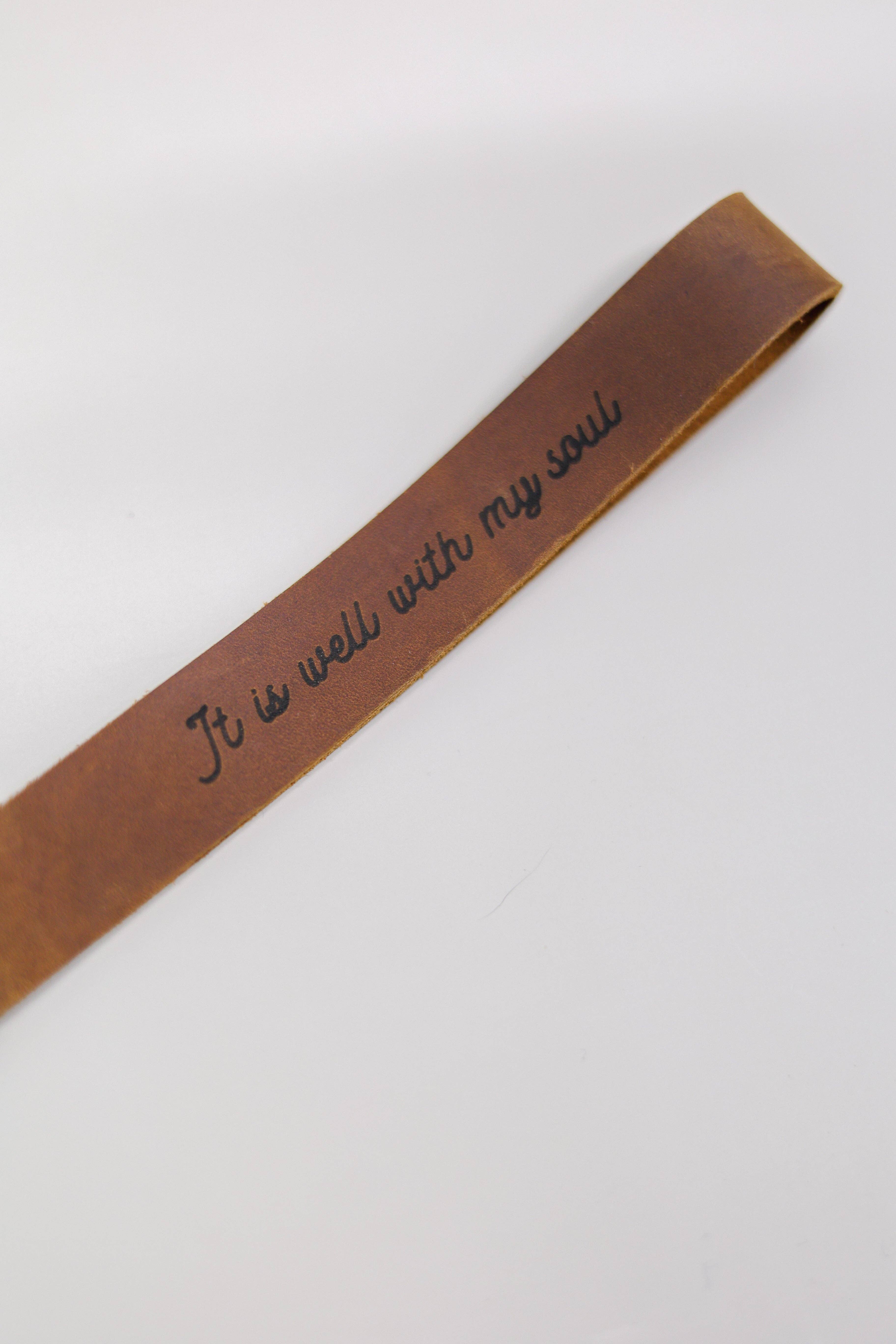 Jubilee Trading Co.  |  Ethical Trade Decor + Accessories - Wholesale Keychain - Unisex - It Is Well With My Soul Wristlet Engraved Leather1