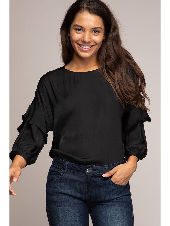 Flowy Blouse With Ruffle Detail and other Purchase Wholesale flowy. Free Returns & Net 60 Terms on Faire trending on Faire.