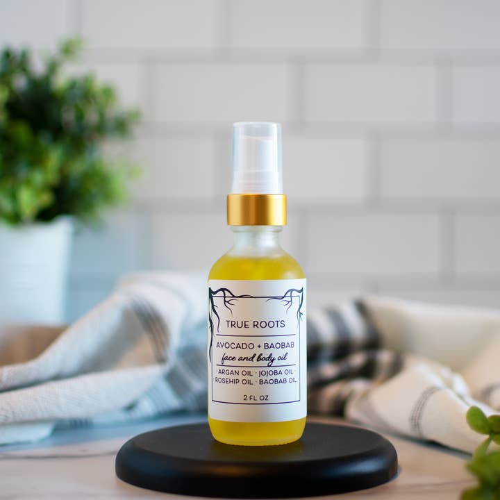 Huile pour le visage et le corps Avocado + Baob pour la vente par True Roots Collaborative