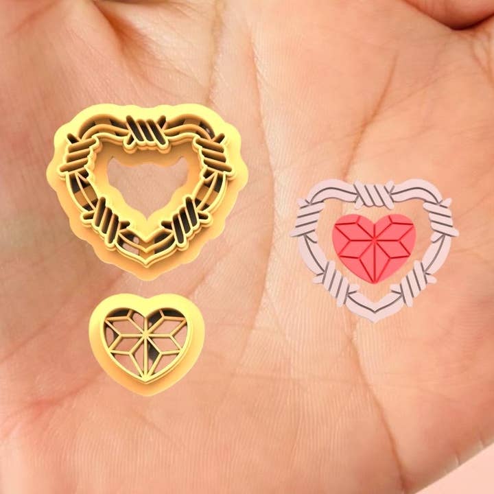 Valentines cutter Barbed Wire heart with Ruby Heart for wholesale by Roussell Prints and Demand LLC