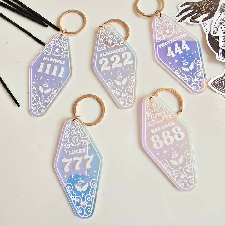 Angel Number Iridescent Motel Keychain and other Purchase Wholesale landelijke accessoires. Free Returns & Net 60 Terms on Faire trending on Faire.