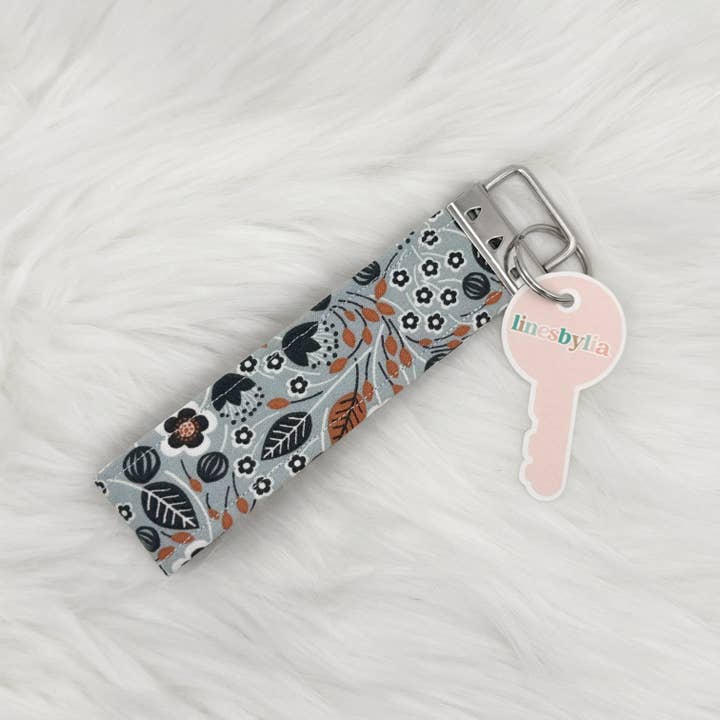 Blue & Orange Floral Wristlet Keychain for wholesale by Paper Giggles