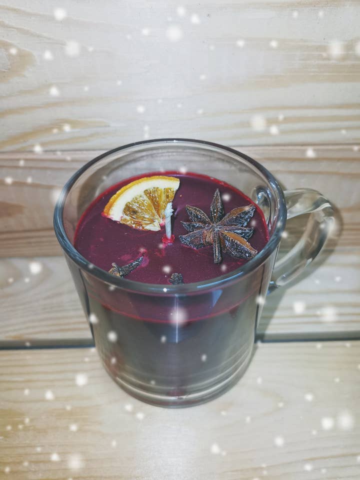 Candela profumata artigianale al profumo di « Vin Chaud » per la vendita all'ingrosso da parte di Biotandem