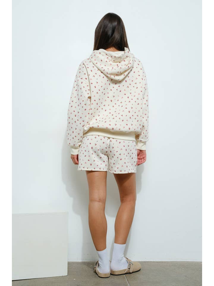 Ivory CHERRY BOW PRINT SWEATSHIRT for wholesale on Faire