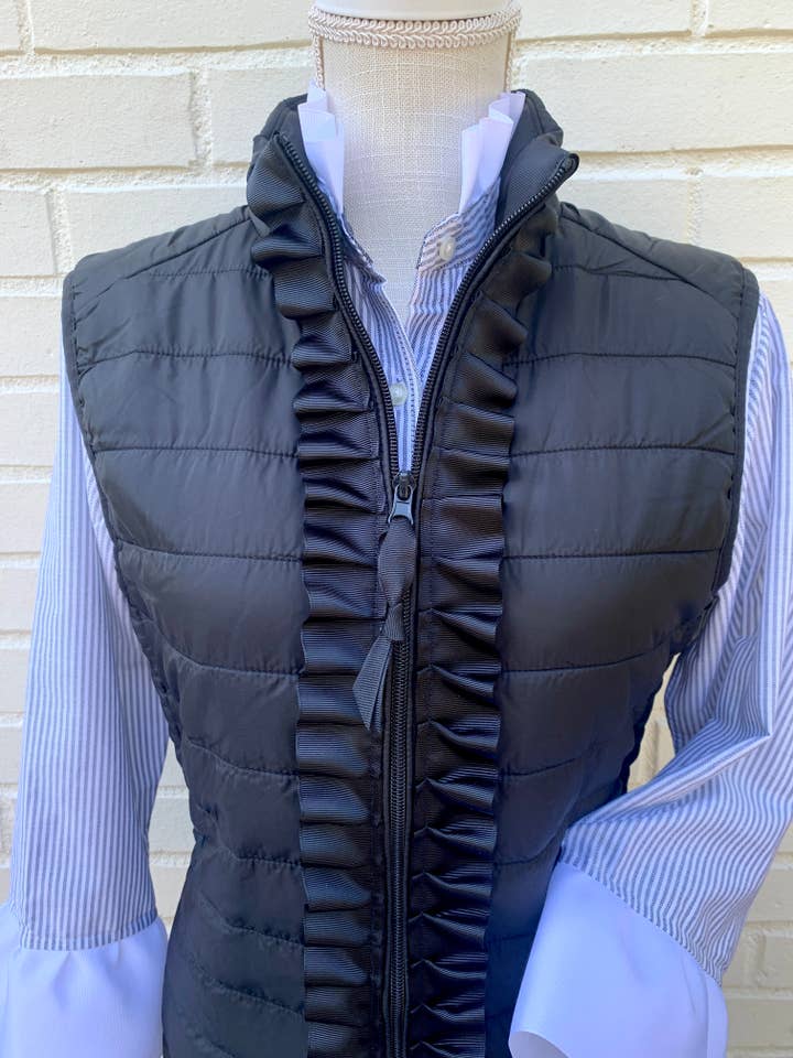 Maggie May Ruffle Puffer Vest - Black w Black Ribbon for wholesale on Faire