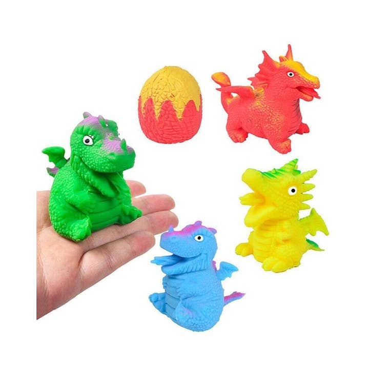 MIX COLOR Treasure Box Reversible Dinosaur Egg Squishies for wholesale on Faire