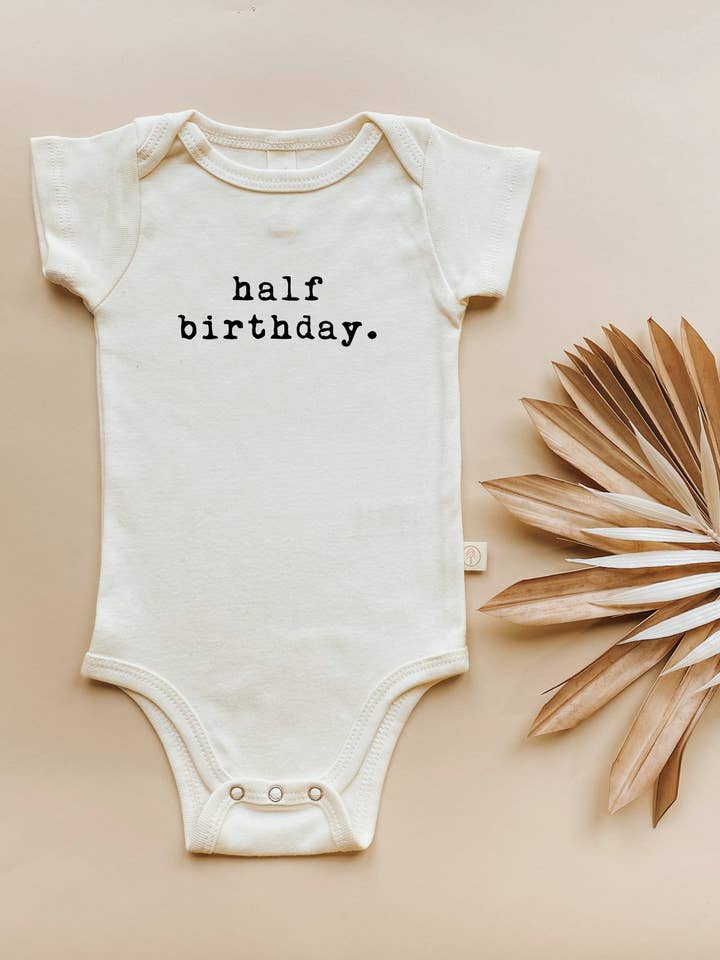 Half Birthday Organic Baby Bodysuit for wholesale by Tenth & Pine