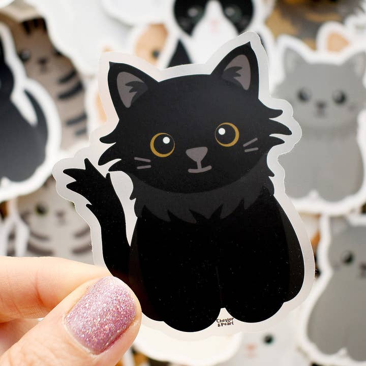 Looks Like My Cat! Long-haired black cat with amber eyes sticker for wholesale by Chester and Pearl