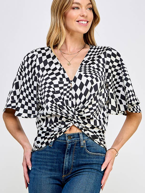 Top à col en V torsadé à effet satiné à imprimé géométrique pour la vente par Melon Fashion