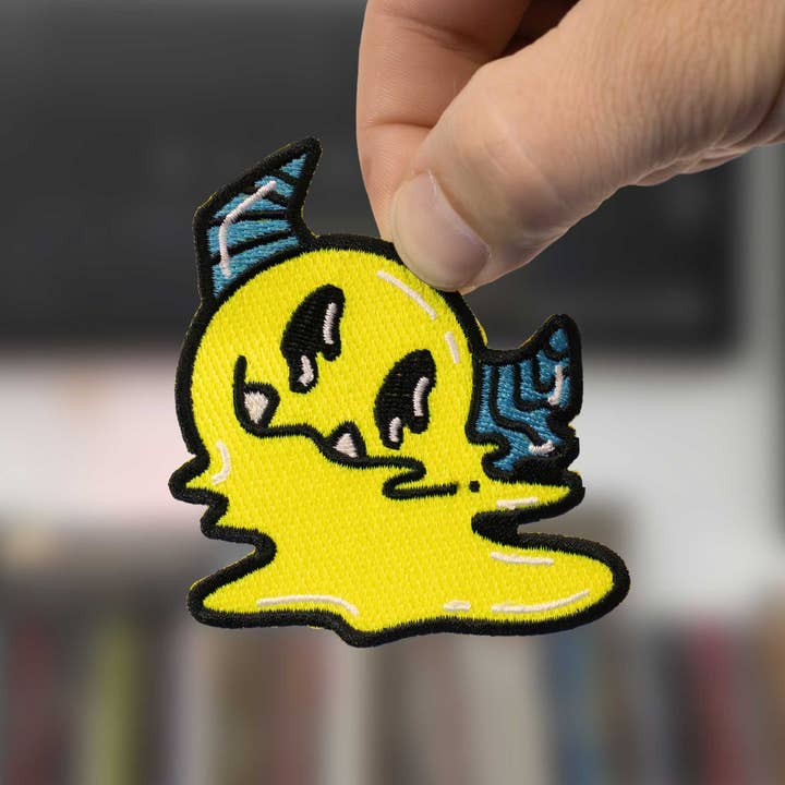 Melty Monster Face Iron-On Patch for wholesale by Hi, Hello There