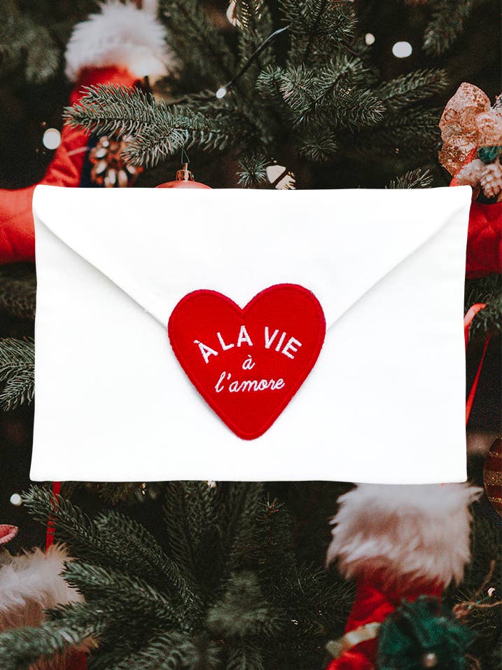 Upcycled heart fabric pouch for wholesale by Un baiser français s'il vous plaît